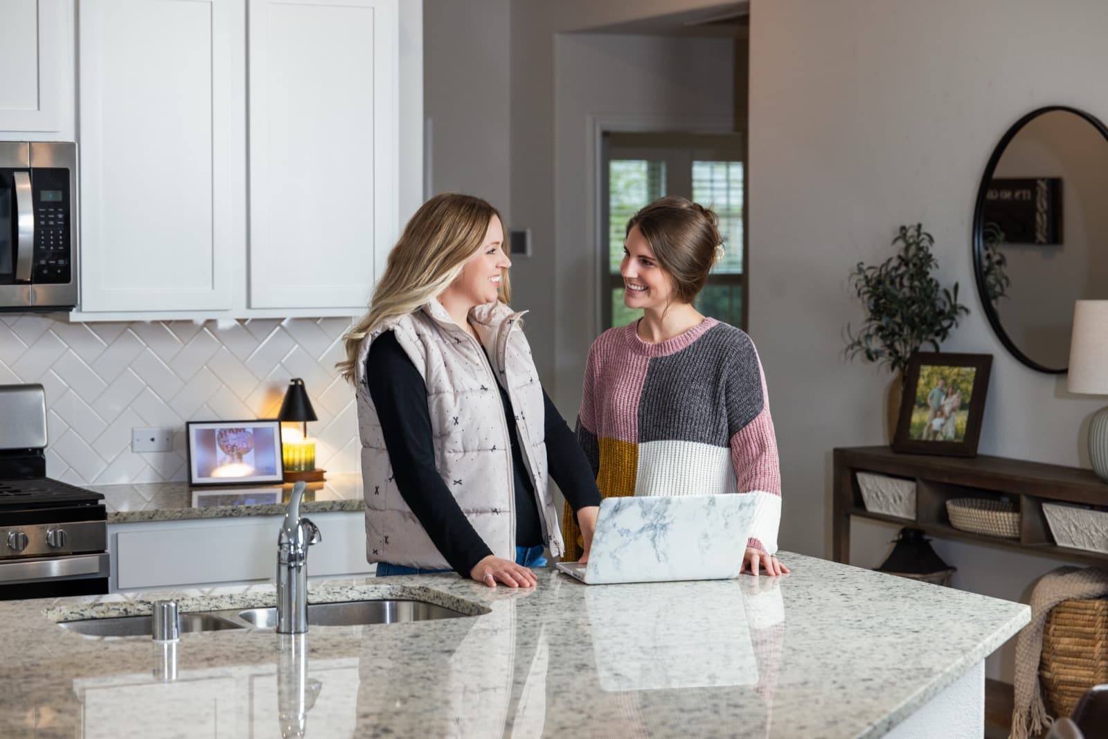 Taylor Clark meeting with clients in their home